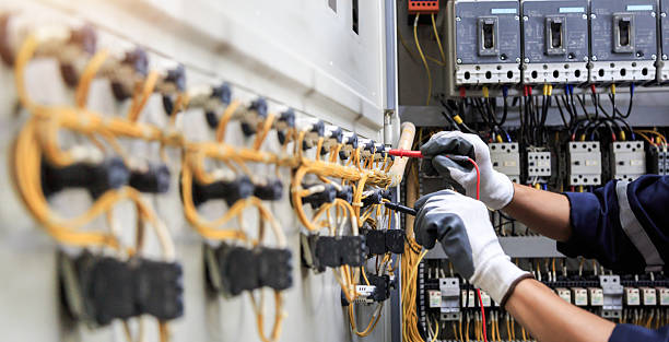 Professional Electrical Panel Upgrade technician working in Brazoria County County, TX